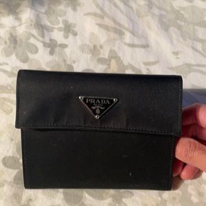 Prada black wallet.